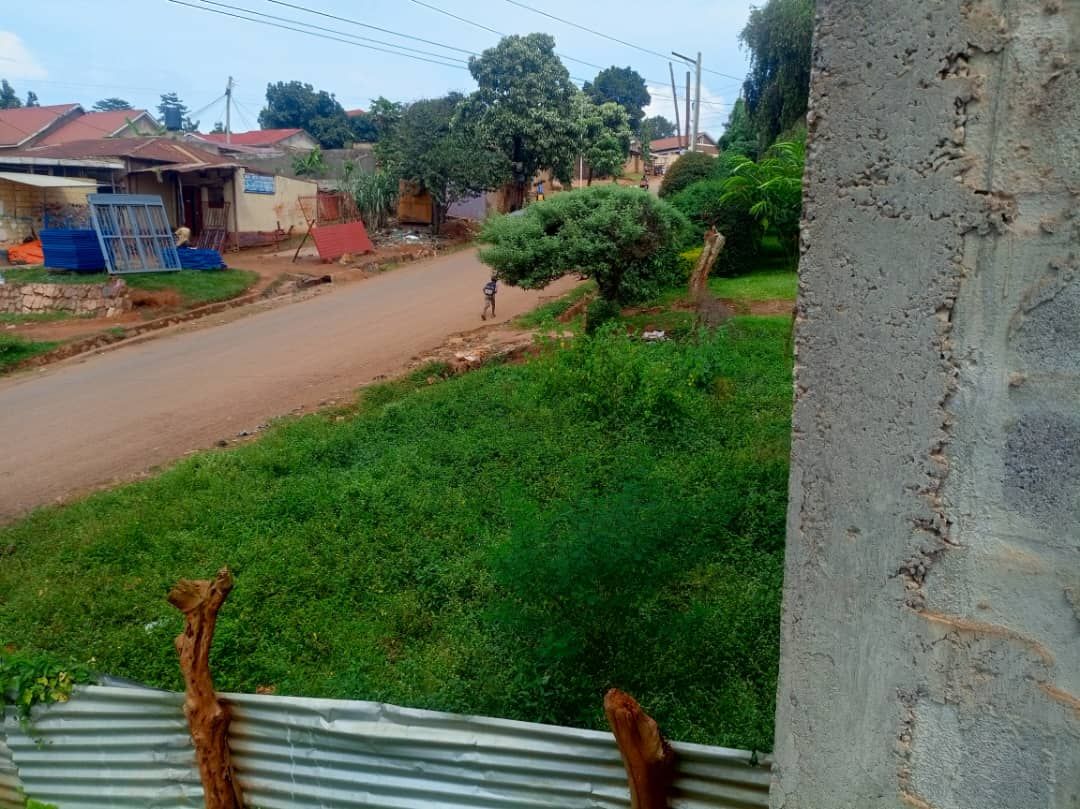 30-Decimals Commercial Land with Semi-Finished Apartment for Sale in Kireka, Kampala, Uganda